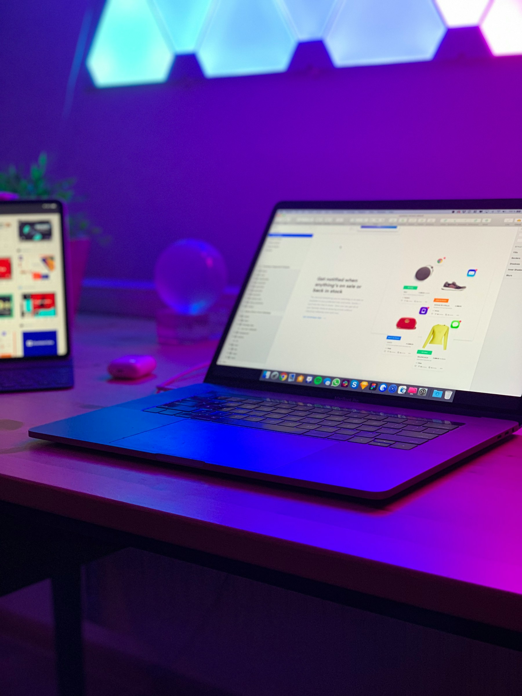 Purple-lit modern laptop workspace used as illustrative Mecilo product photography